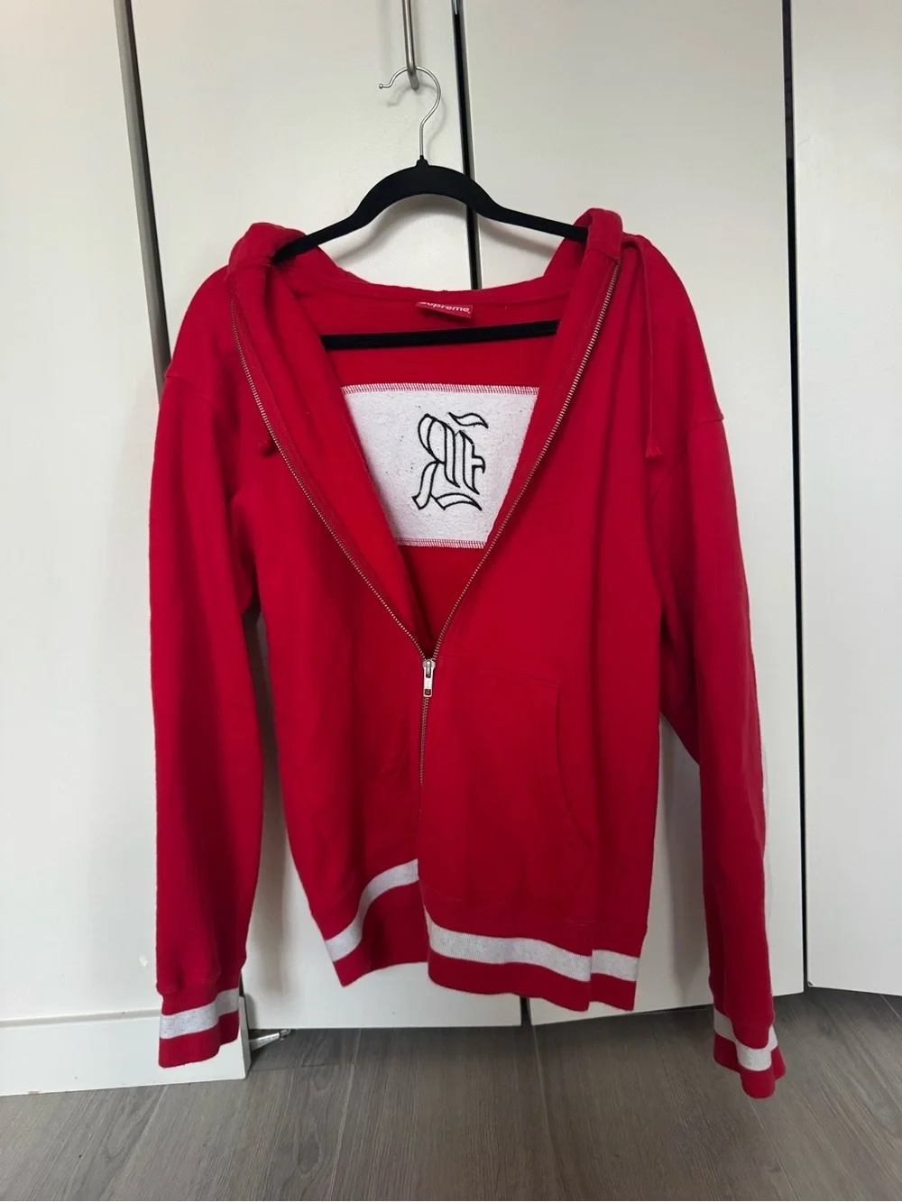 Supreme Red and White Zip-Up Hoodie with Gothic Script